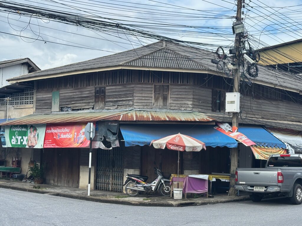 a building with awnings and umbrellas