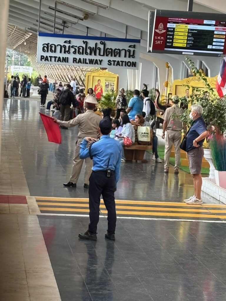 a group of people in a train station