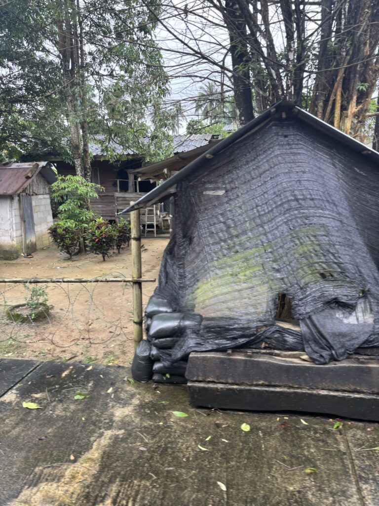 a black plastic covering a shelter