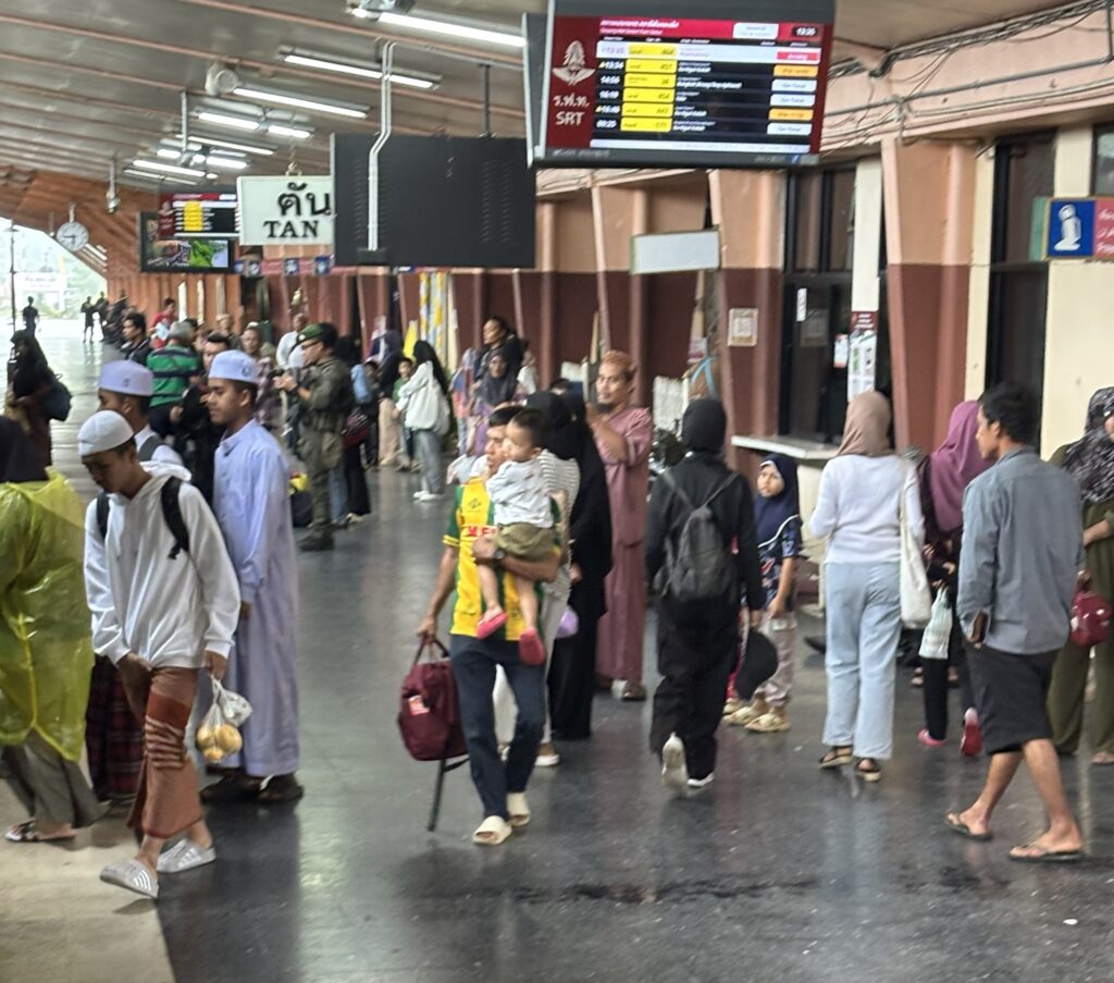 a group of people in a train station