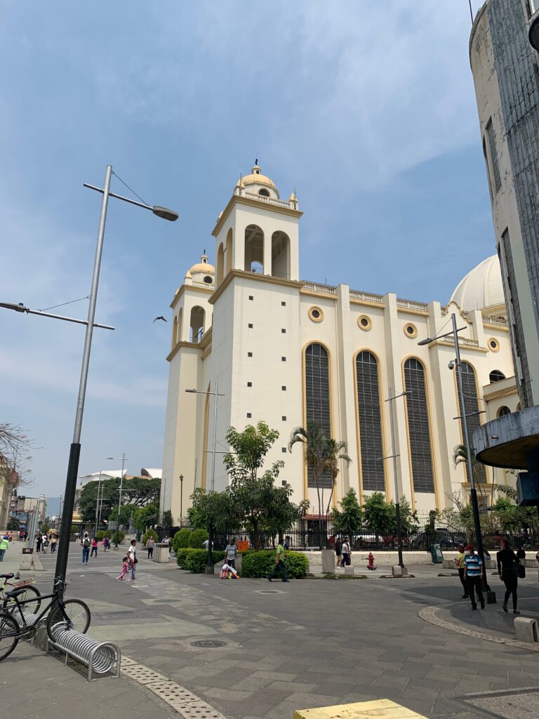 a large white building with a dome and a dome on top with Los Angeles Union Station in the background