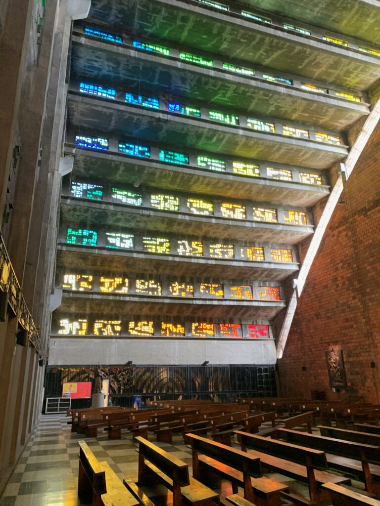 a multicolored stained glass windows in a building