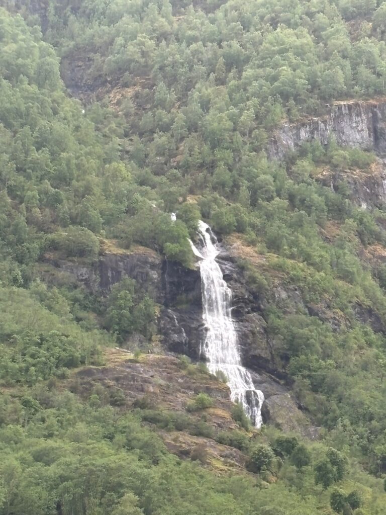 a waterfall on a mountain