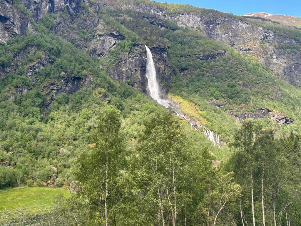a waterfall on a mountain