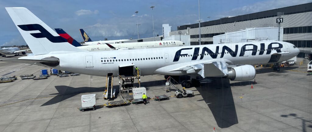 a large white airplane at an airport