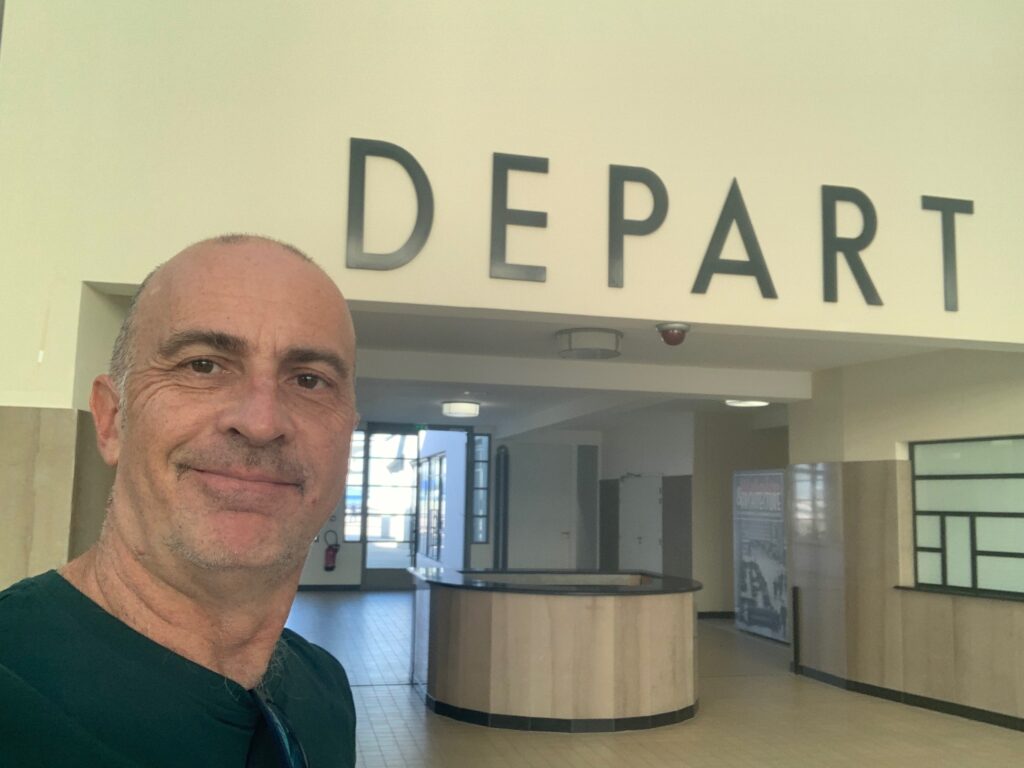 a man smiling at camera