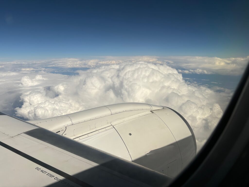 a view of clouds from an airplane window