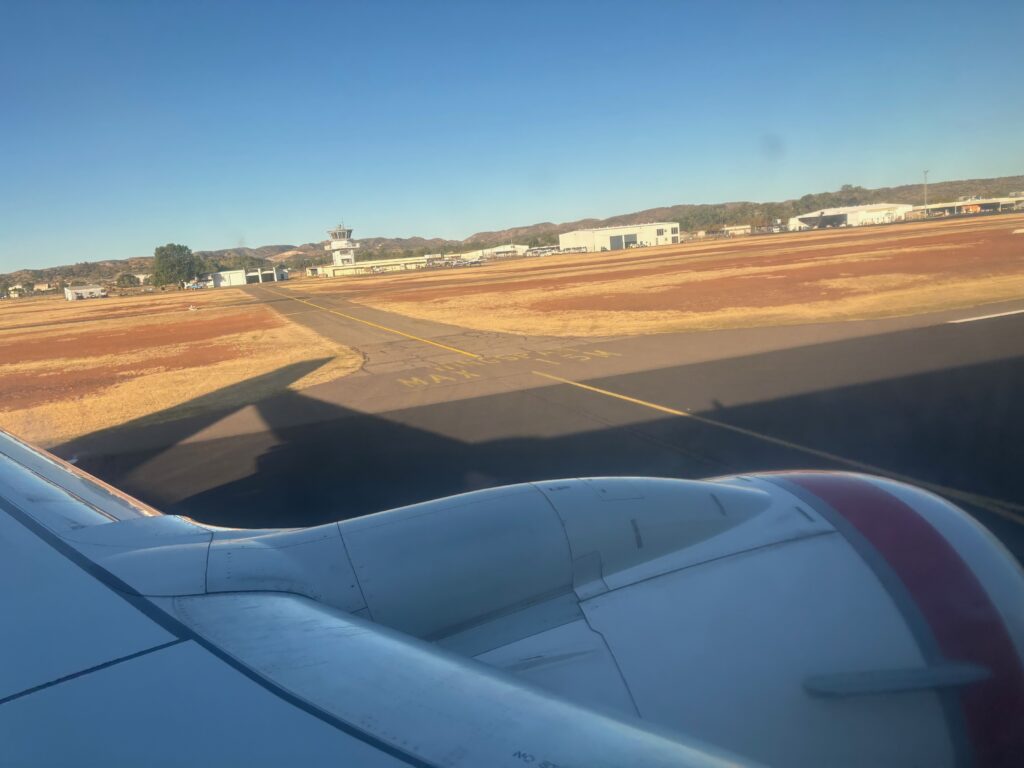 an airplane wing on a runway