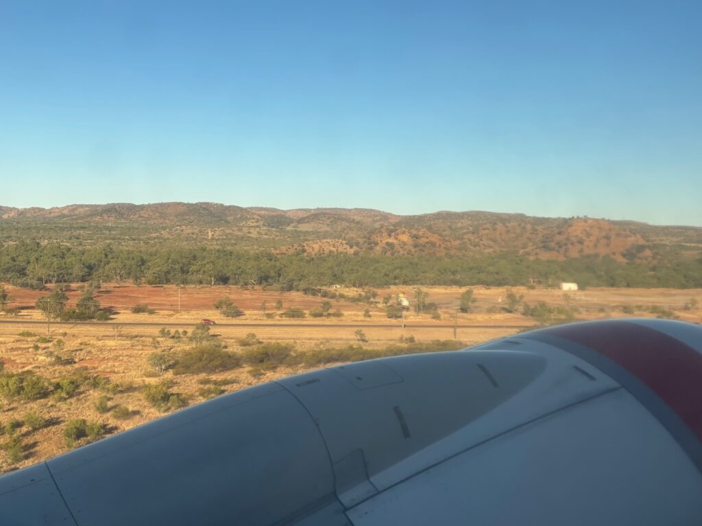 a view of a landscape from an airplane