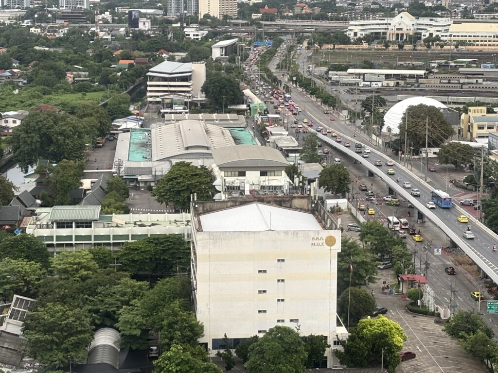 a city with many cars and buildings
