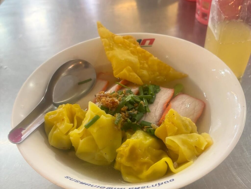a bowl of food with a spoon