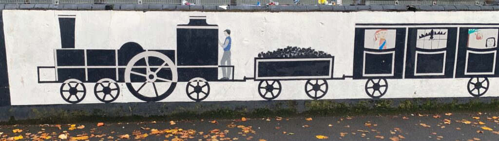 a mural of a man on a train