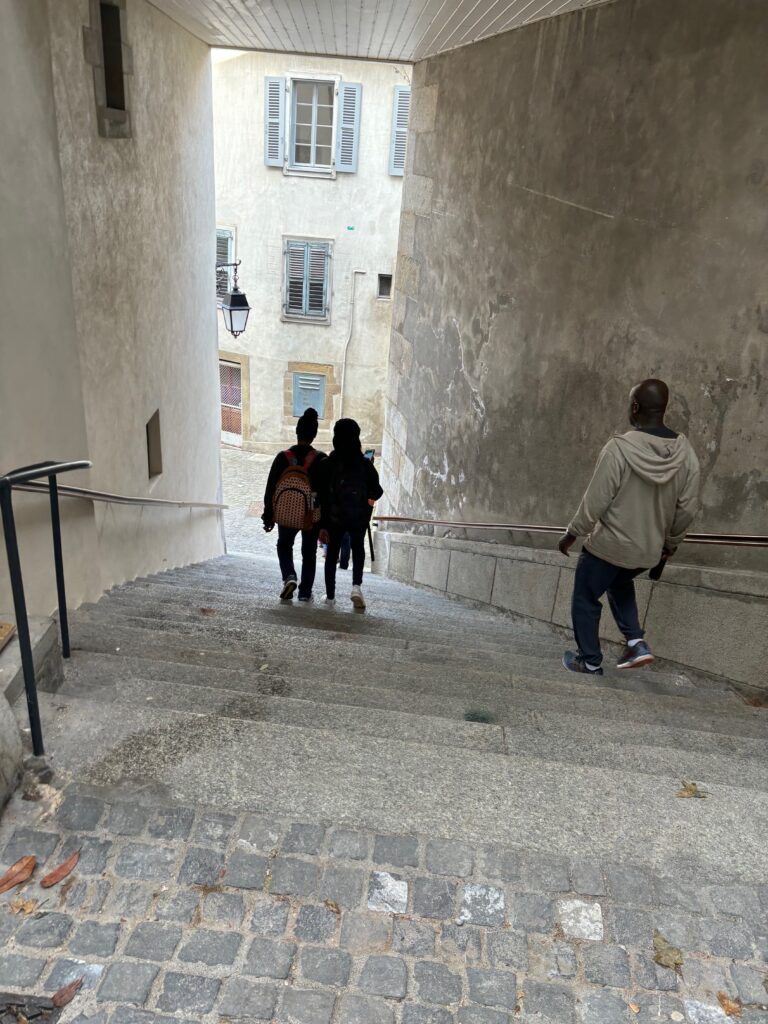 a group of people walking up stairs