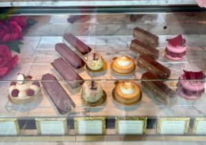a display case with different types of pastries
