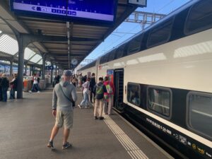 a group of people at a train station