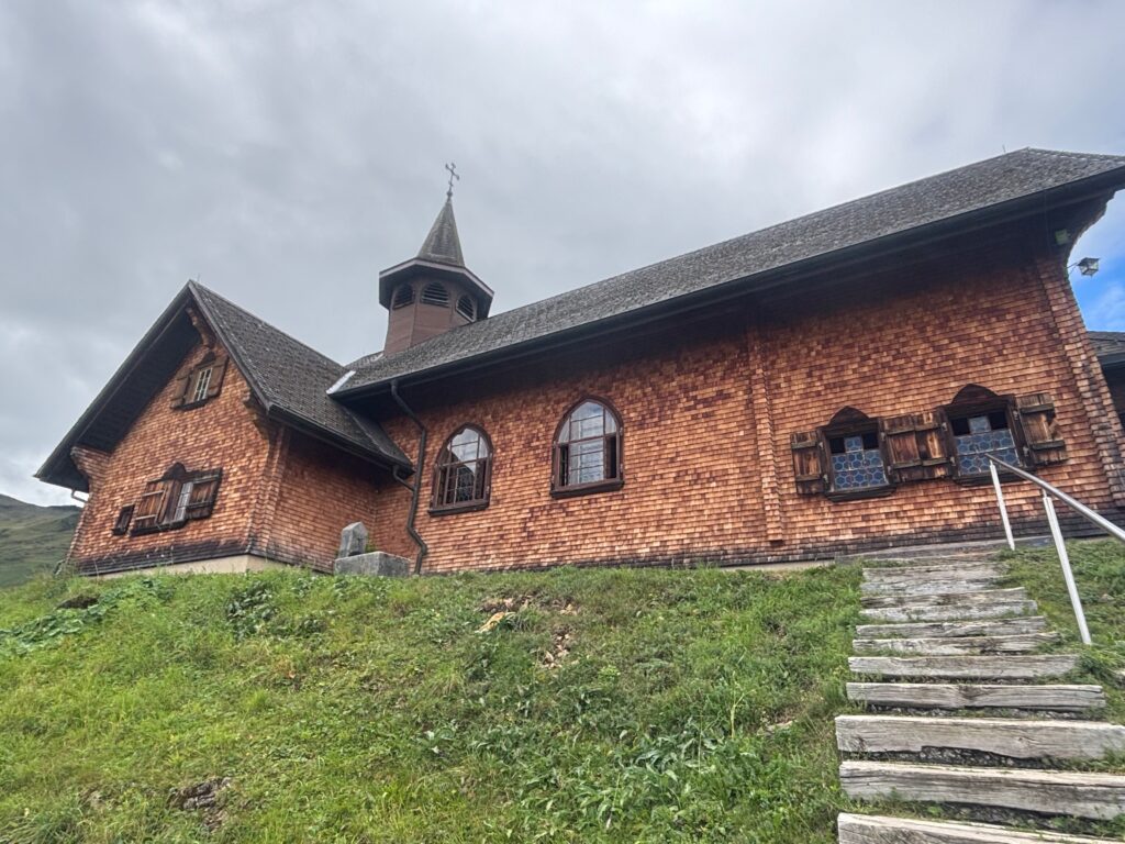 a brick building with a steeple on the side