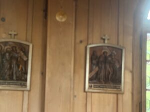 a couple framed pictures on a wall