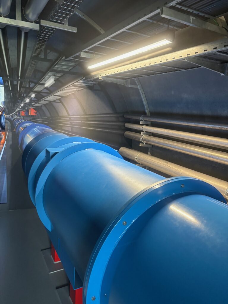a blue pipes in a tunnel