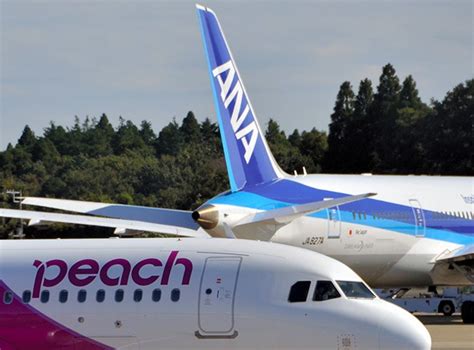 a group of airplanes parked in a runway