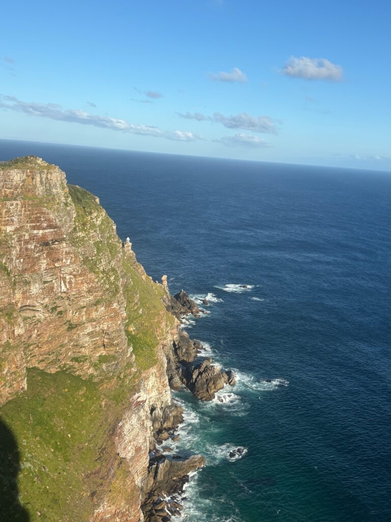 a cliff above the water
