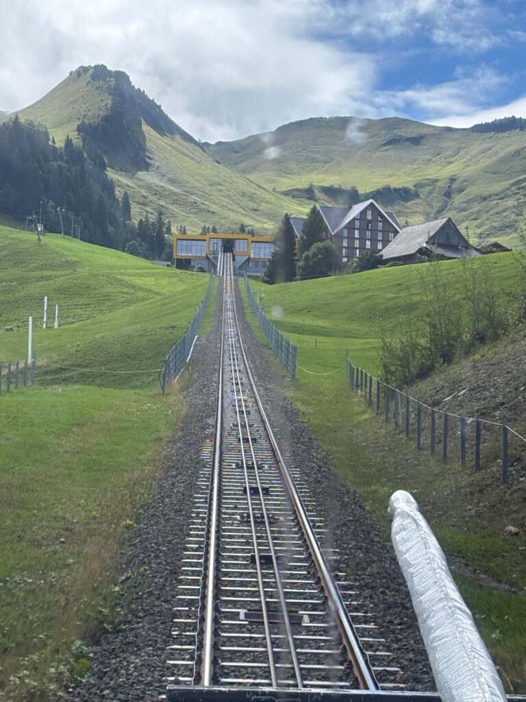 a train tracks going down a hill