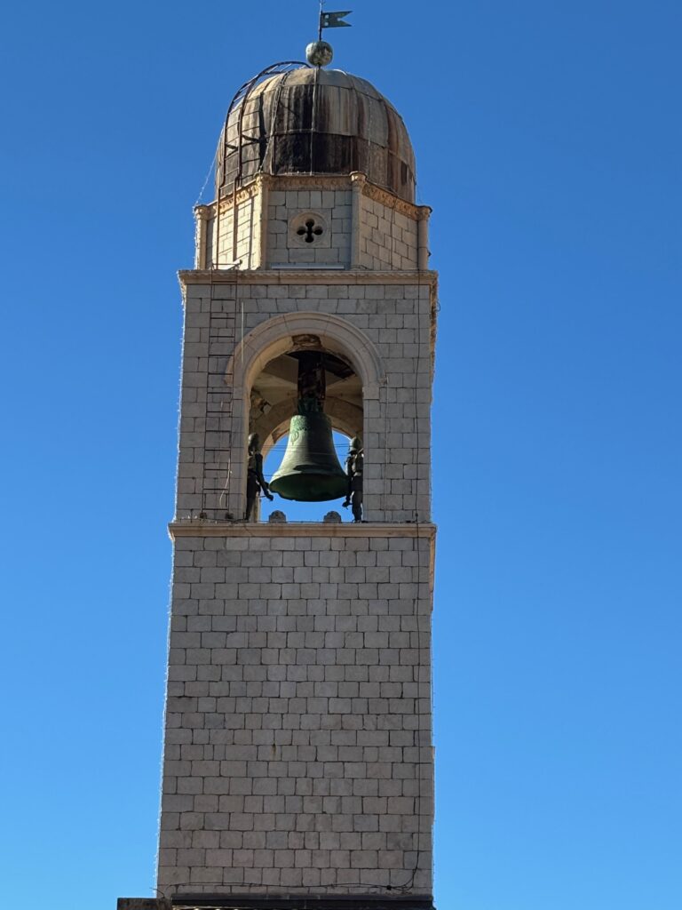 a bell tower with a dome