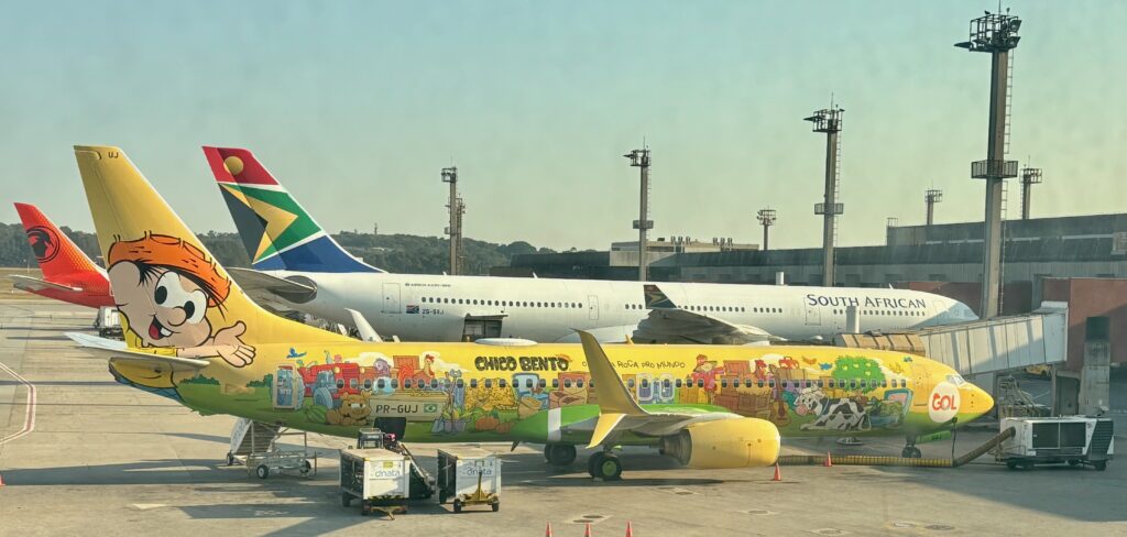 airplanes parked at an airport