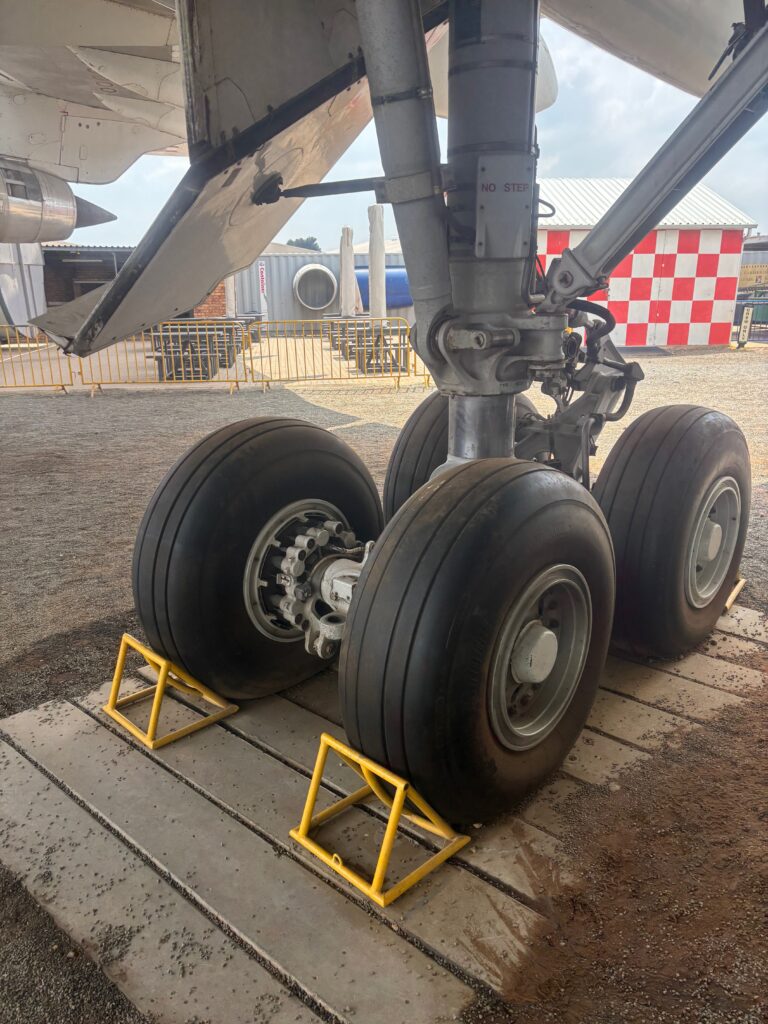 a close up of a plane's landing gear
