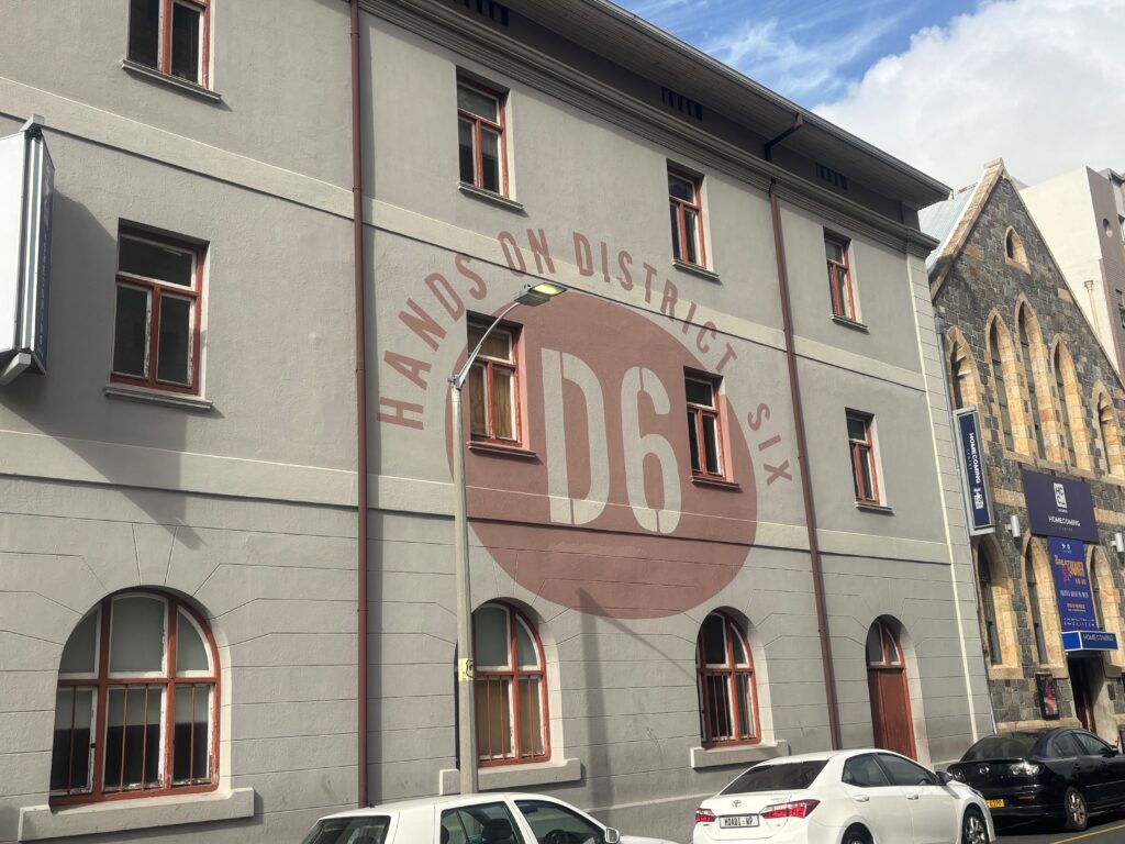 a building with cars parked in front of it