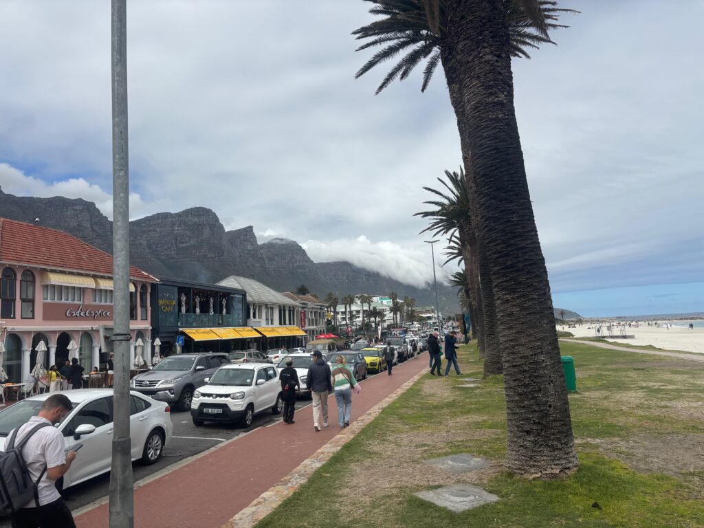 a street with cars and buildings on the side