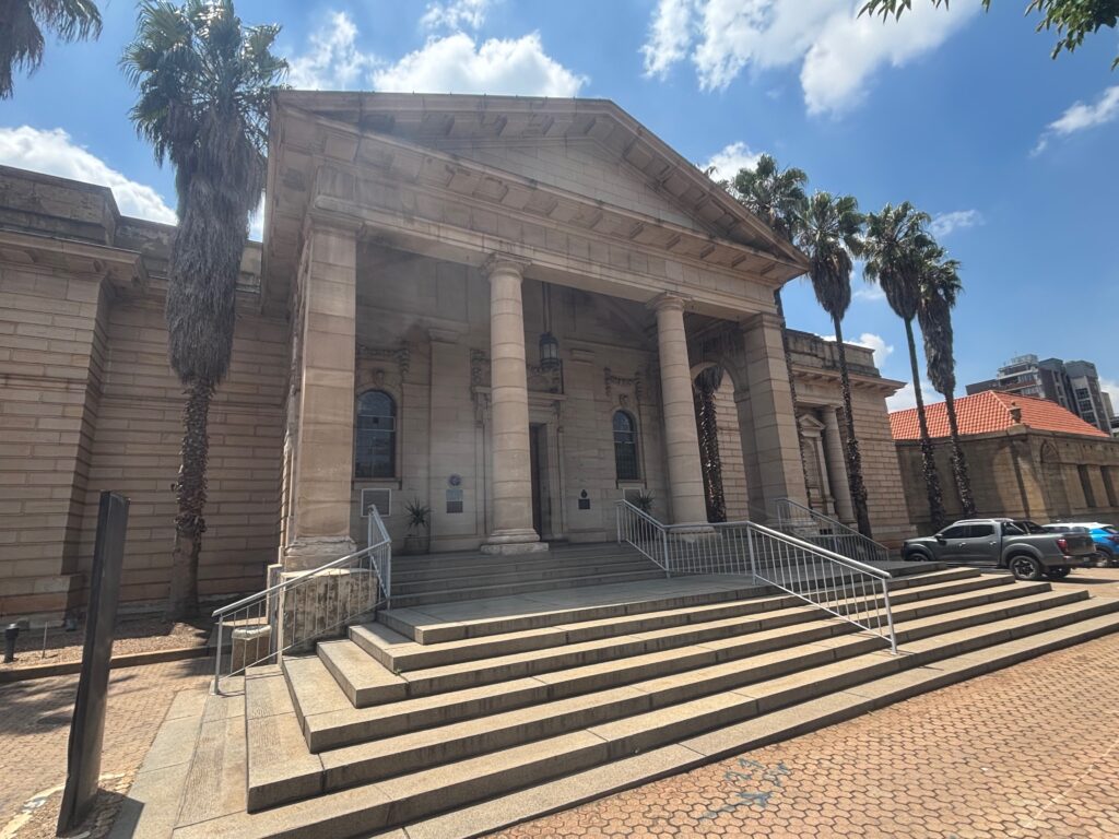 a building with columns and steps