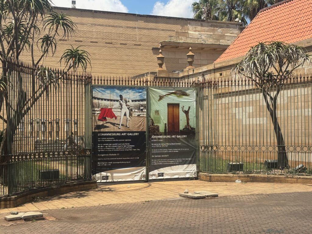 a gate with a sign on it