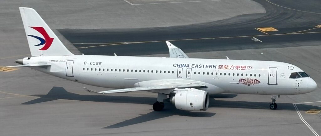 a white airplane on a runway