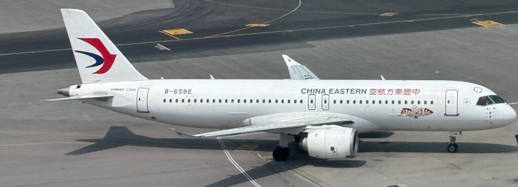 a white airplane on a runway