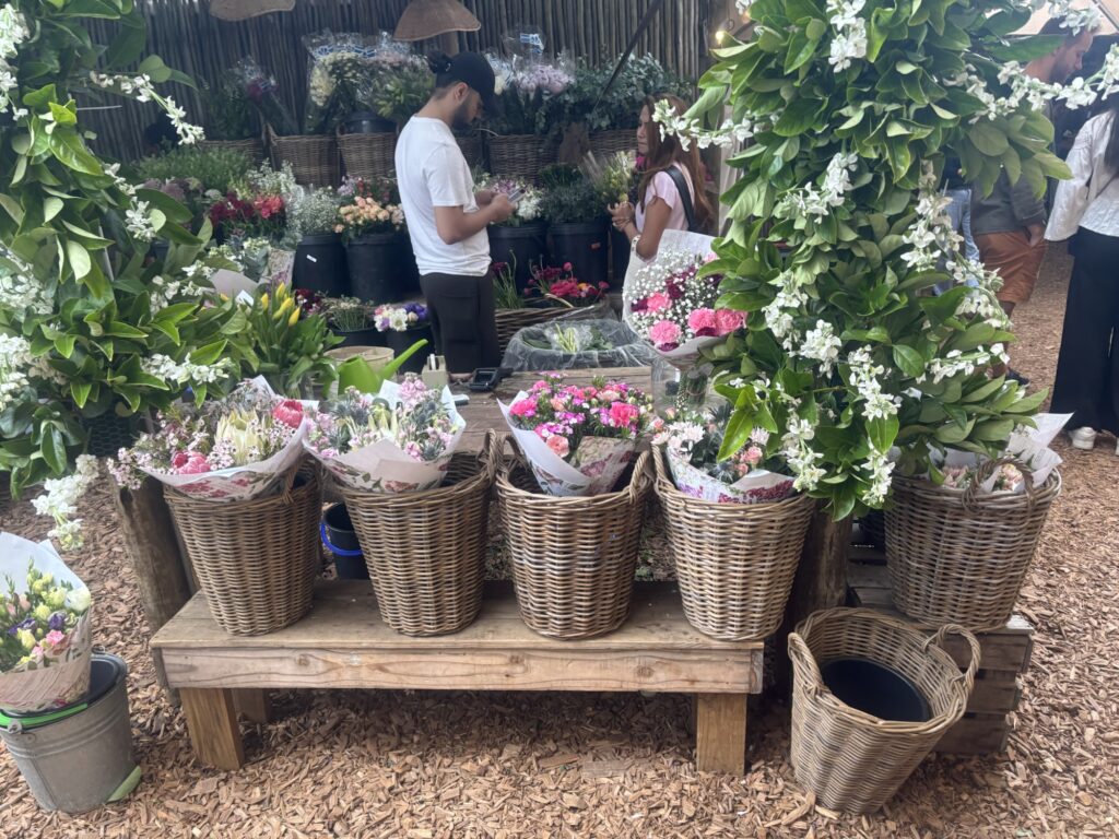 a group of baskets of flowers