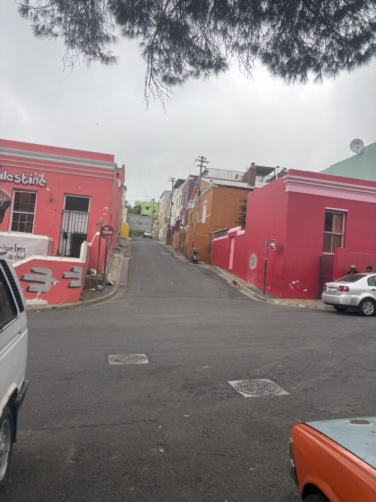 a street with buildings and cars