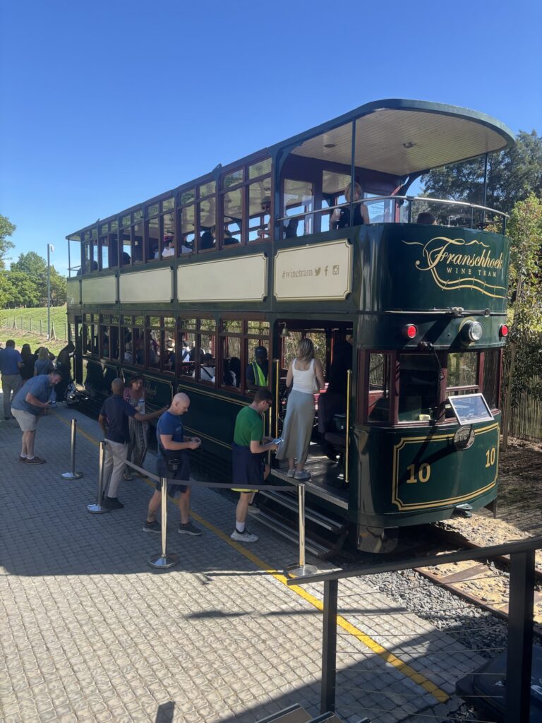 people standing around a trolley