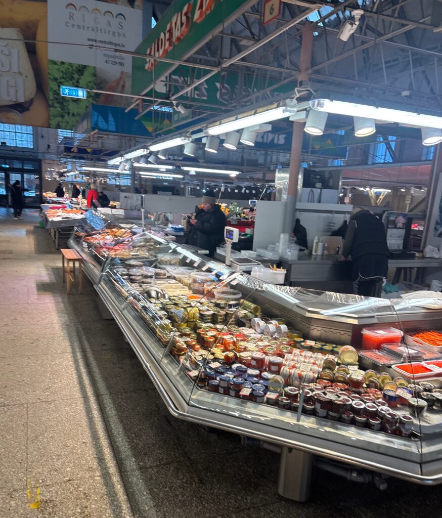 a food market with people in the background