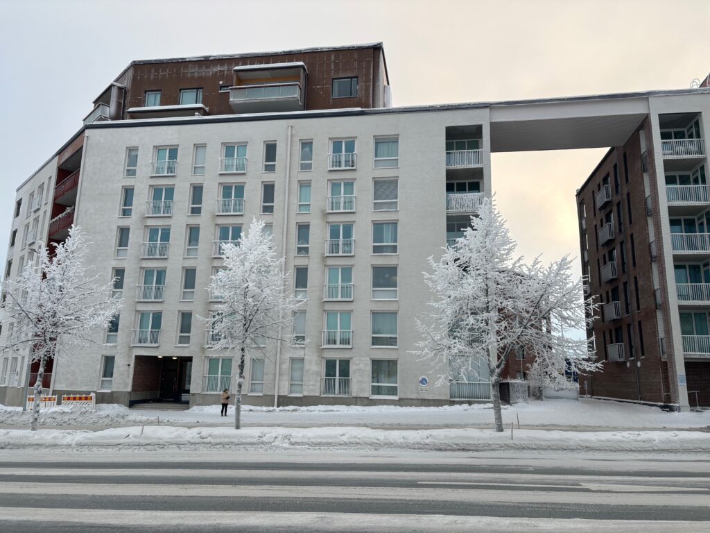 a building with snow on the ground