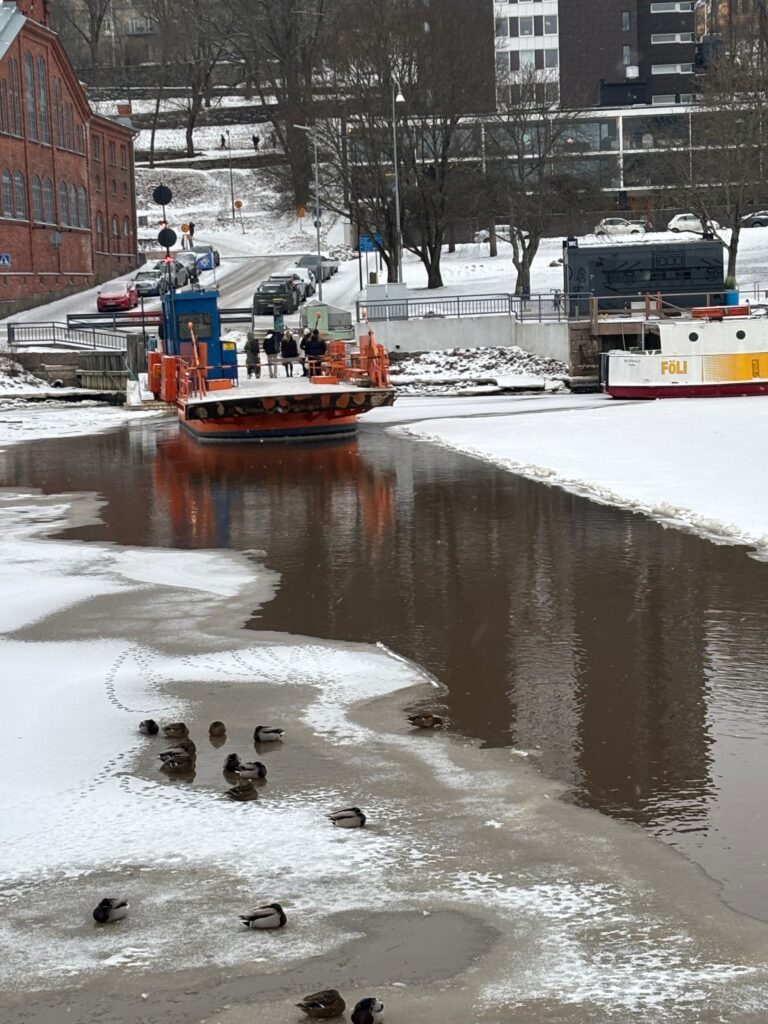 a boat on a frozen river
