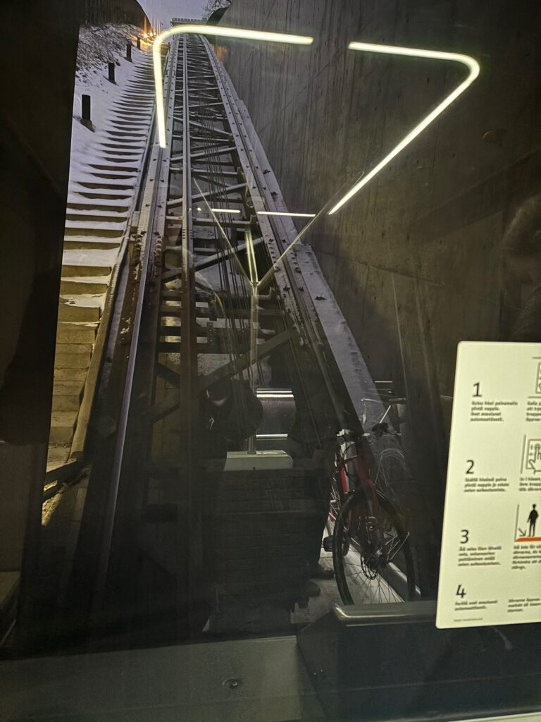 a metal train tracks in a tunnel