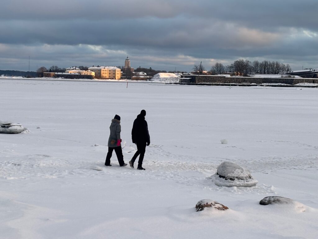 people walking in the snow