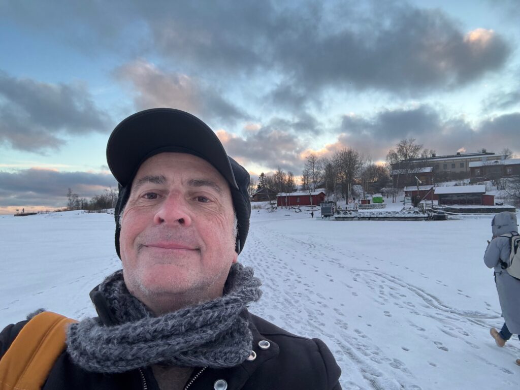 a man taking a selfie in the snow