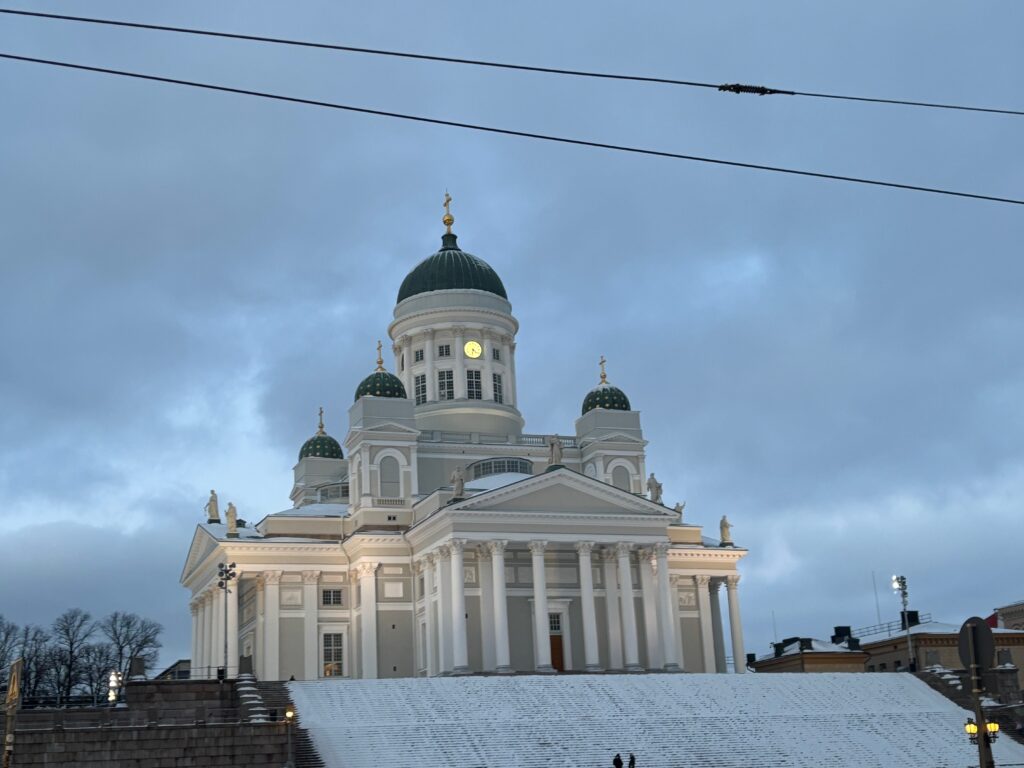 a building with a dome and a steeple