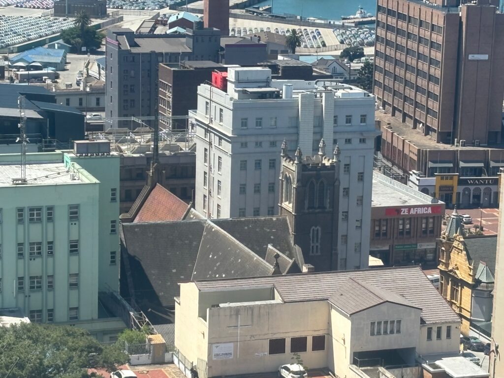 a city with many buildings and a body of water