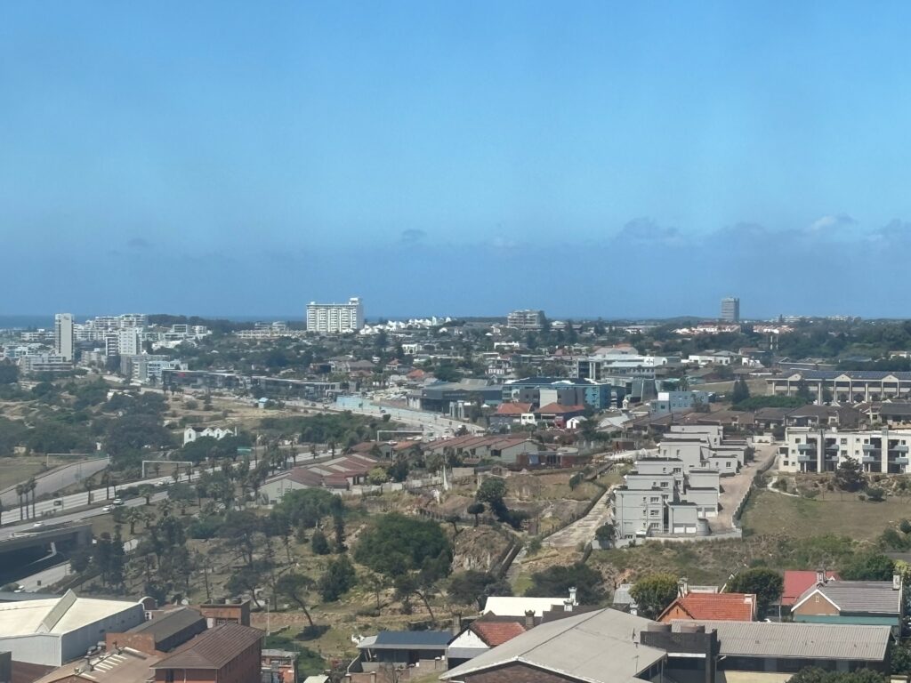 a city with many buildings and trees