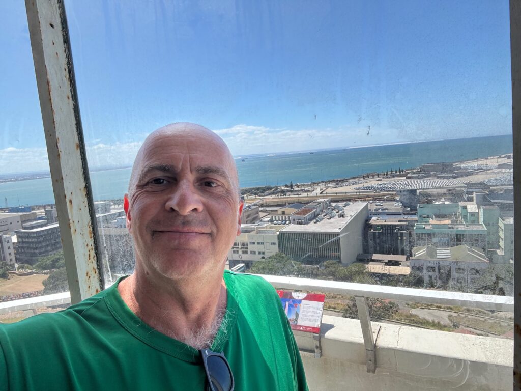 a man in a green shirt