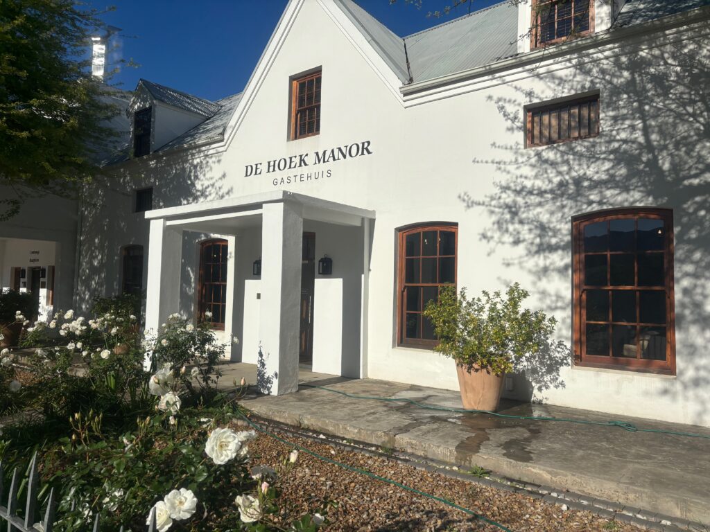 a white building with a sign on it