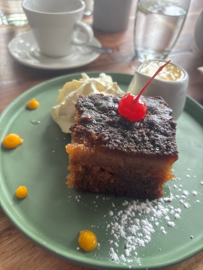 a piece of cake with a cherry on top