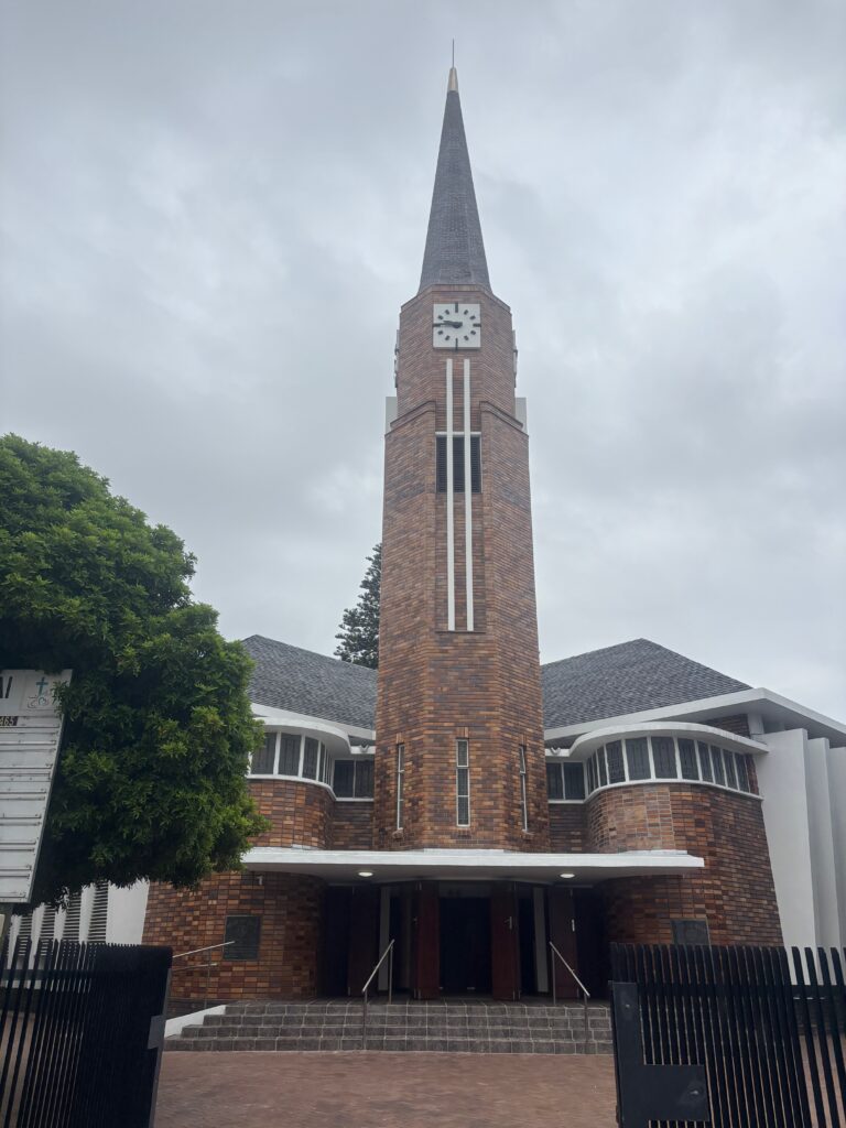 a brick building with a clock tower